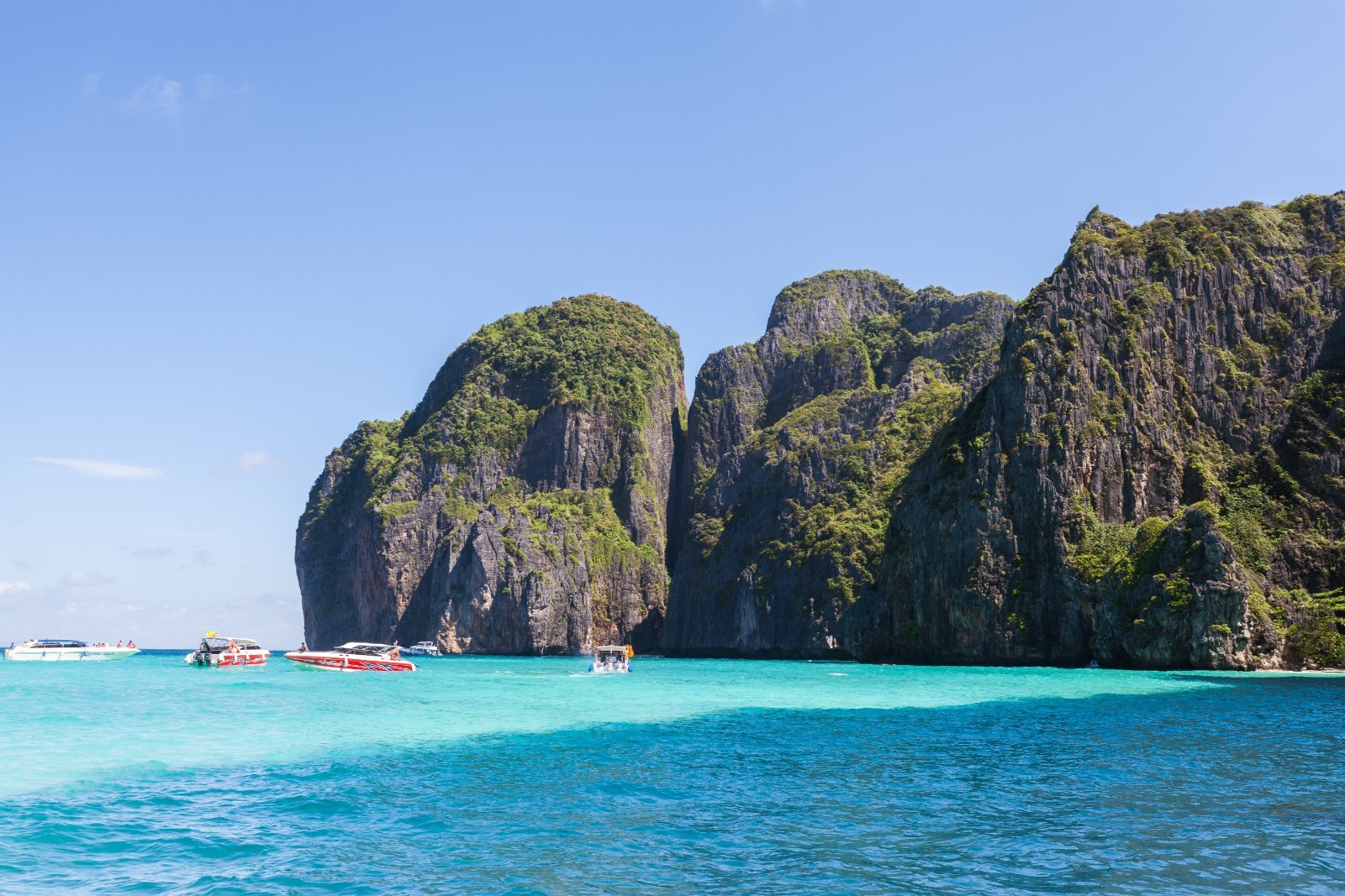 Maya Bay, Koh Phi Phi Leh, Thailand, turquoise water framed by limestone cliffs