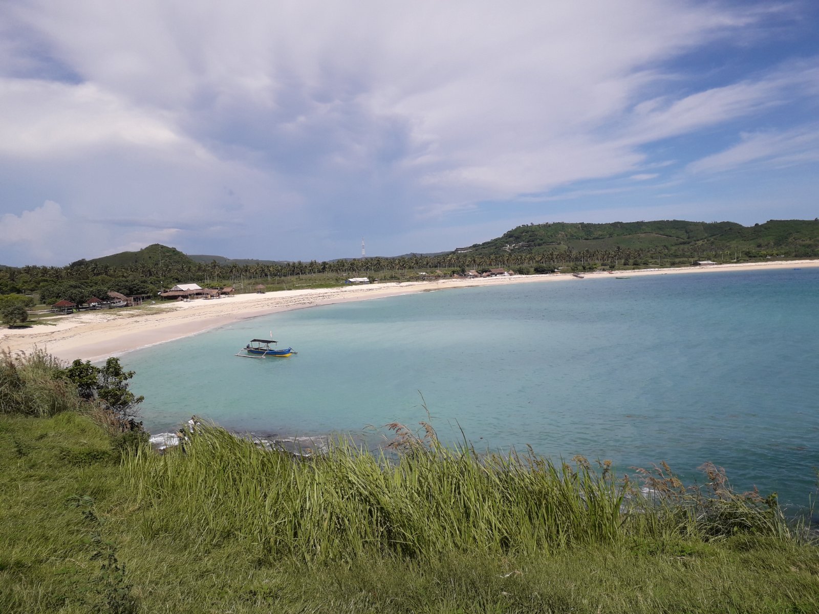 Senggigi Beach on Lombok, Indonesia, with calm turquoise water