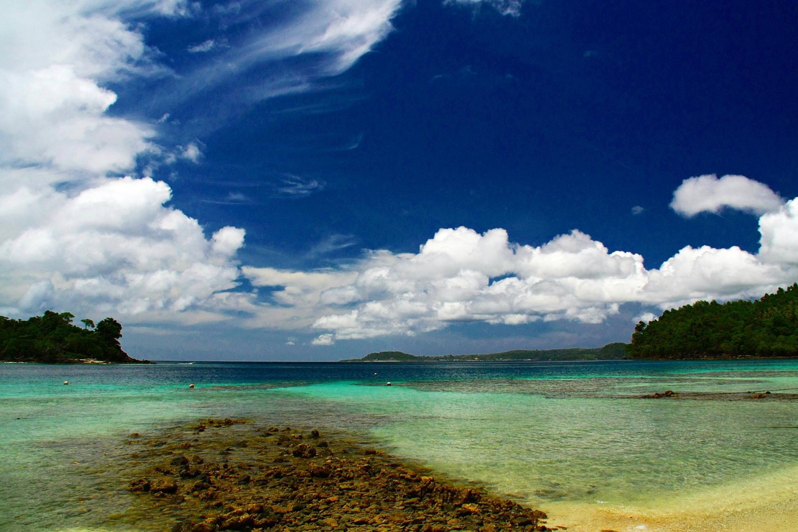 Illustrative Sabang, Aceh coastline; not a photograph of the resorts compared below