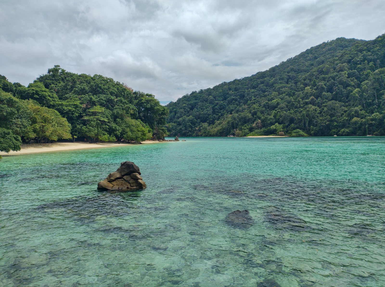 Illustrative Surin Islands bay scenery; not a photograph of a specific dive site