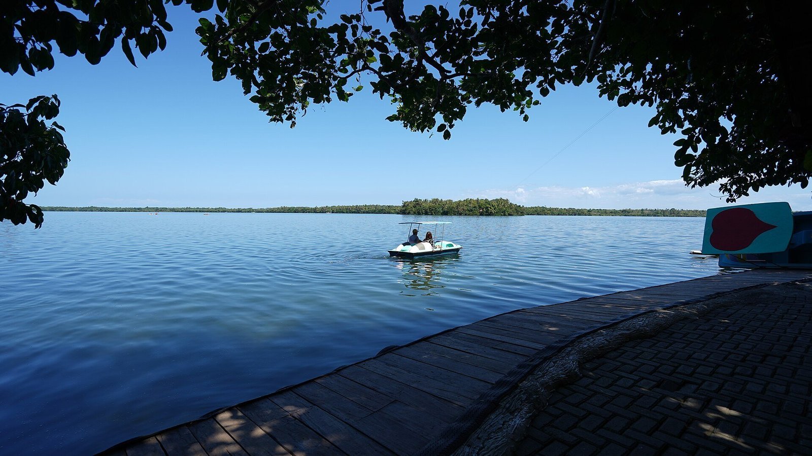 Illustrative lake and hillside scenery on Camotes Island; not a specific resort shown below