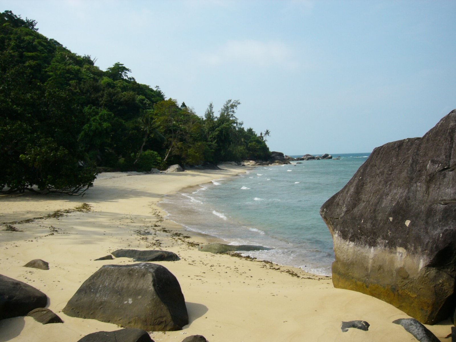 Calm turquoise sea and beach on Tioman Island in dry season