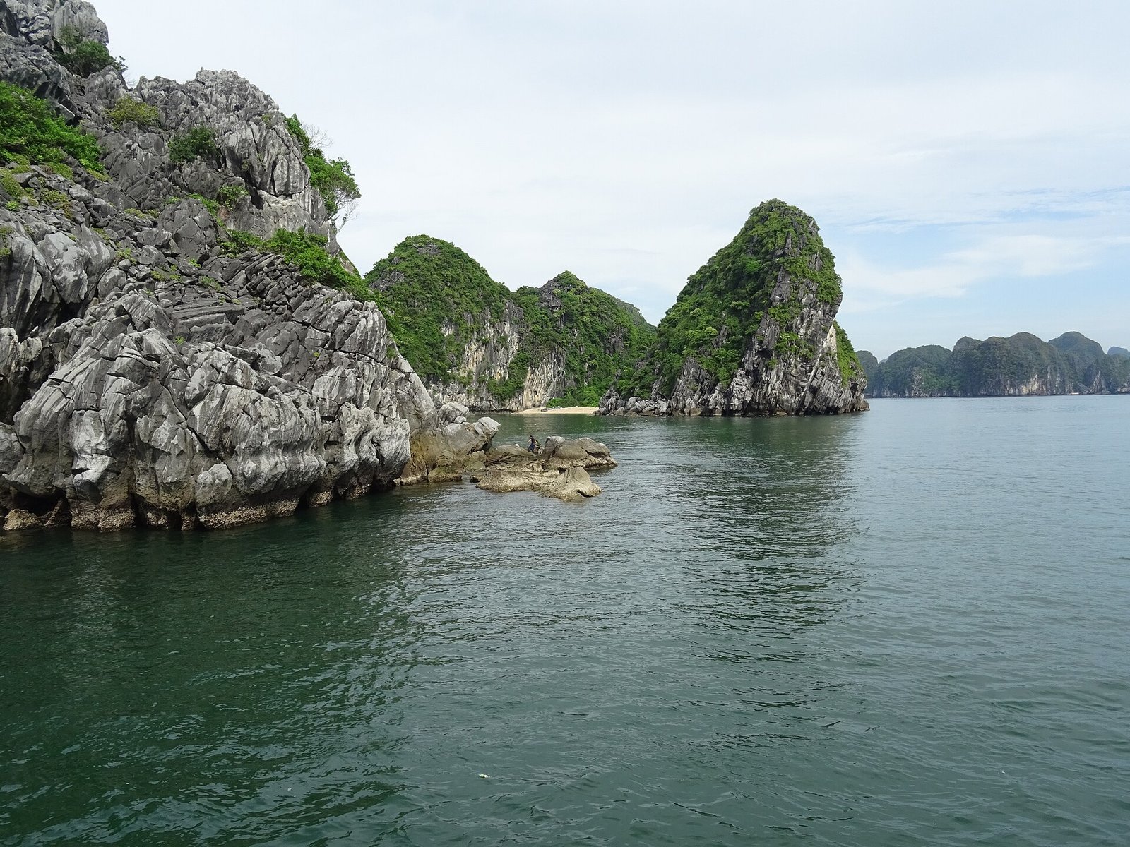Limestone karsts rising from Lan Ha Bay near Cat Ba Island, Vietnam