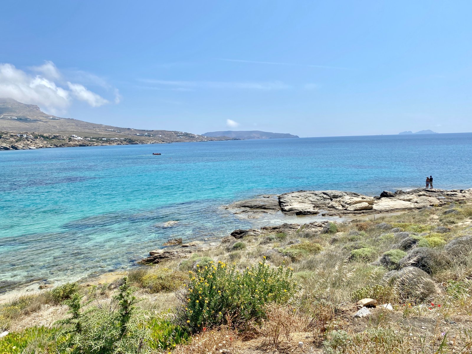 Quiet Divounia beach cove on Mykonos with turquoise water