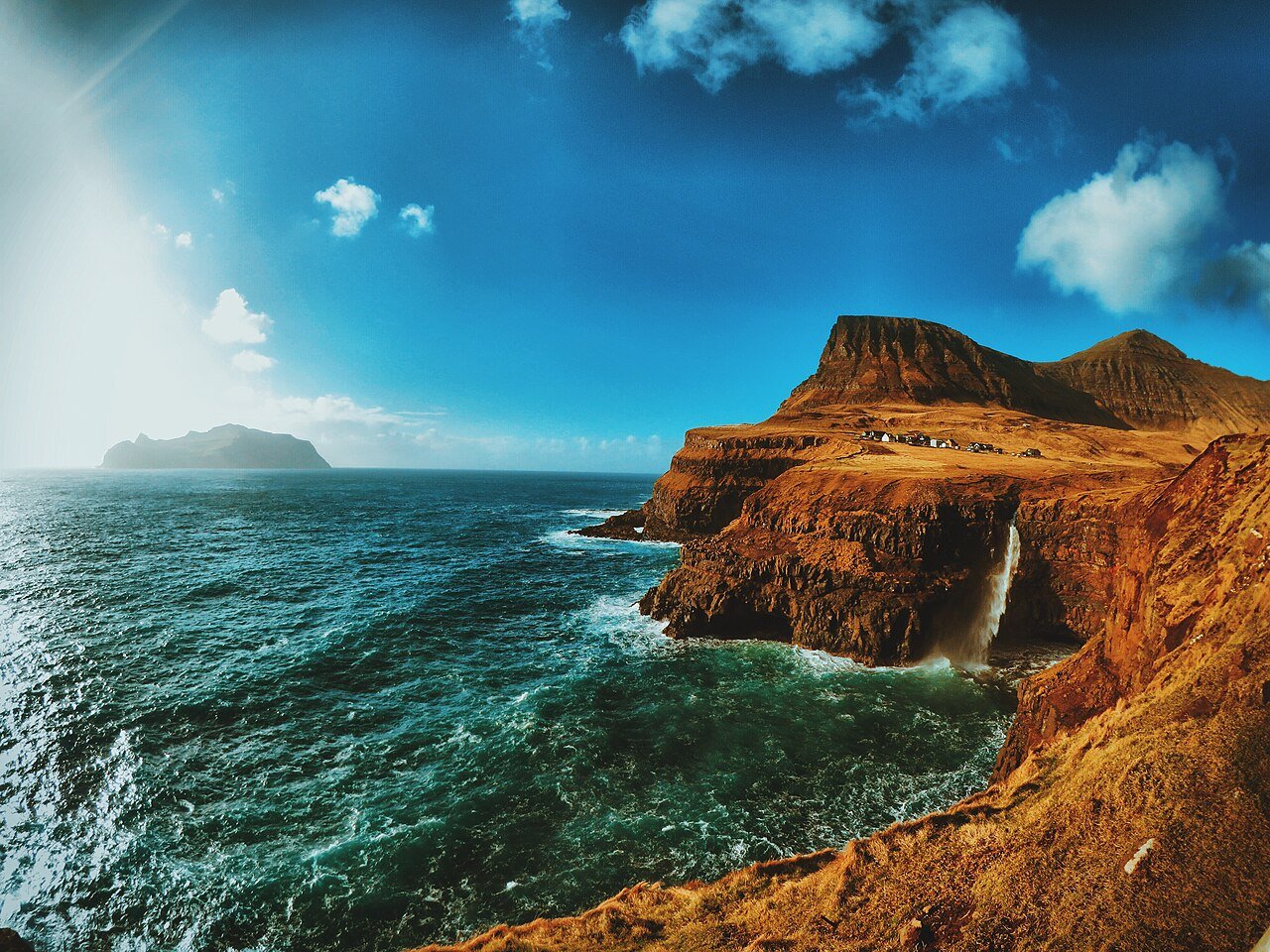 Gásadalur waterfall, Faroe Islands · illustrative photograph · Photo: Felipe Tofani, CC BY-SA 2.0, via Wikimedia Commons