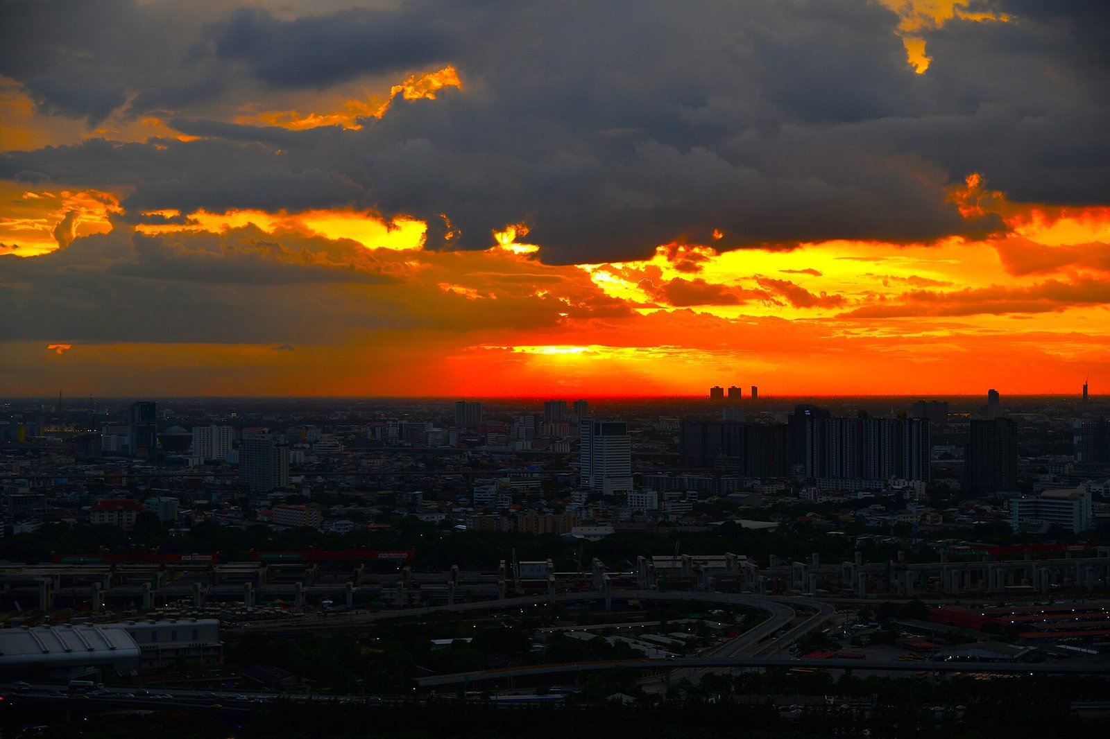 Illustrative sky over Thailand; not a specific monsoon event