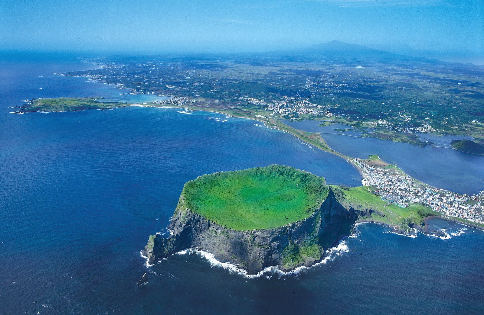 Aerial view of Seongsan Ilchulbong tuff cone on the east coast of Jeju Island