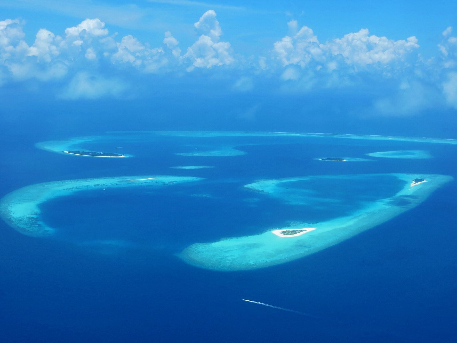 Ari Atoll vs Baa Atoll 2026: Which Maldives Atoll?