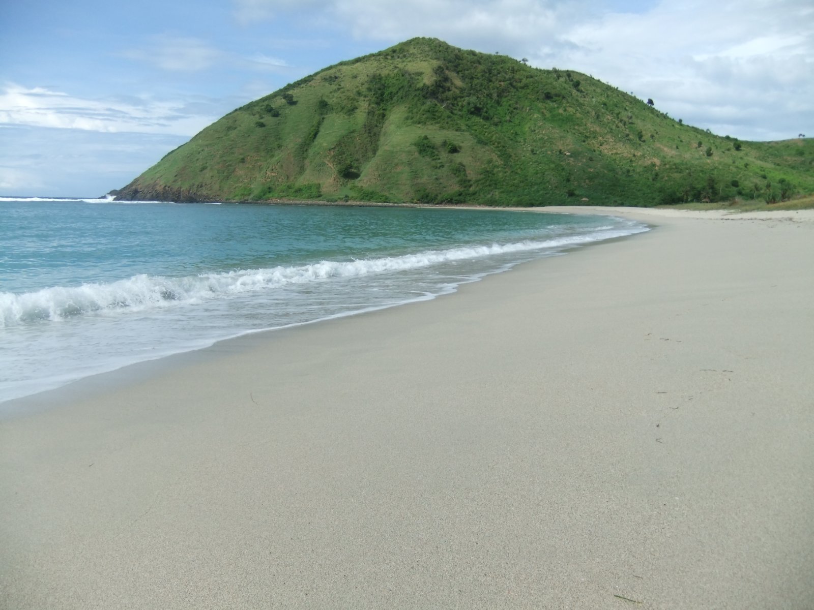 Mawun Beach, a curved turquoise bay in South Lombok, Indonesia