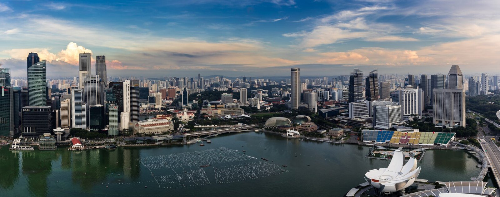 500px provided description: This shot is done from the rooftop of the Sands in Marina Bay in Singapore. [#yellow ,#trees ,#sky ,#landscape , — Photo: Wolfgang Weber, CC BY 3.0, via Wikimedia Commons
