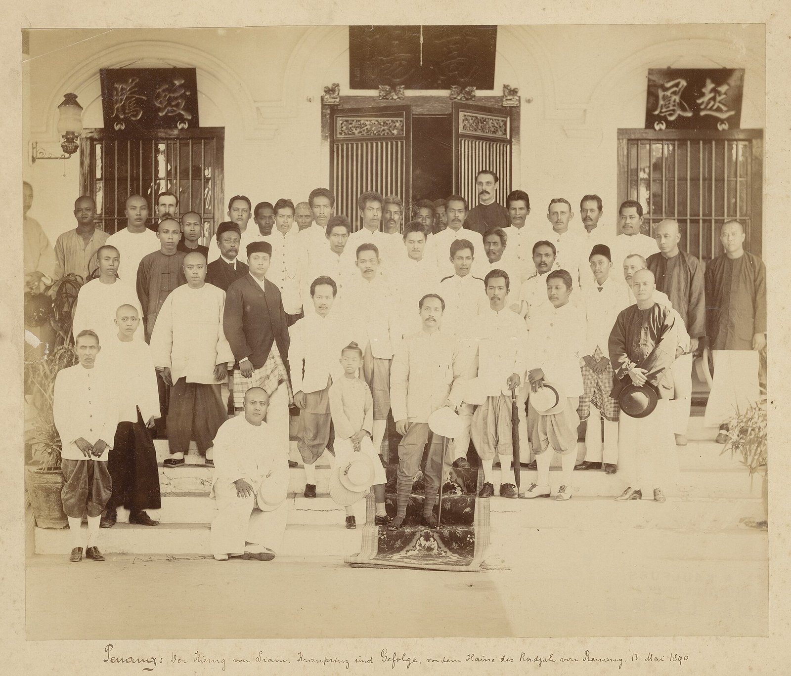 King Chulalongkorn with Prince Vajirunhis and entourage wear the Raj Pattern costume, 1890. This photograph was taken by the German photogra — Photo: August E. Kaulfuss (1861-1908), Public domain, via Wikimedia Commons