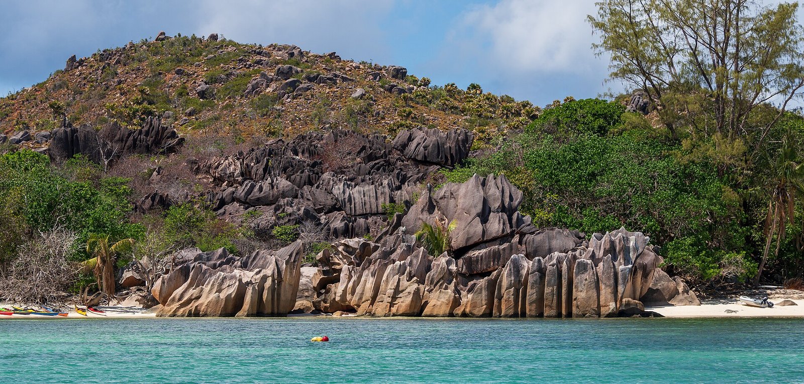 Granite rocks on the coast of Curieuse Island, Seychelles. — Photo: NorbertNagel, CC BY-SA 4.0, via Wikimedia Commons