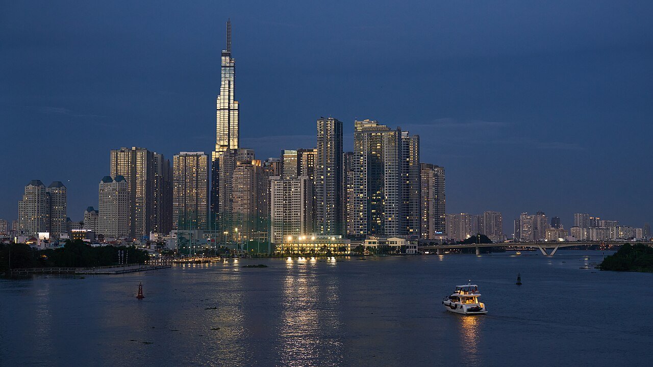 Saigon River skyline at blue hour, Ho Chi Minh City · illustrative photograph
