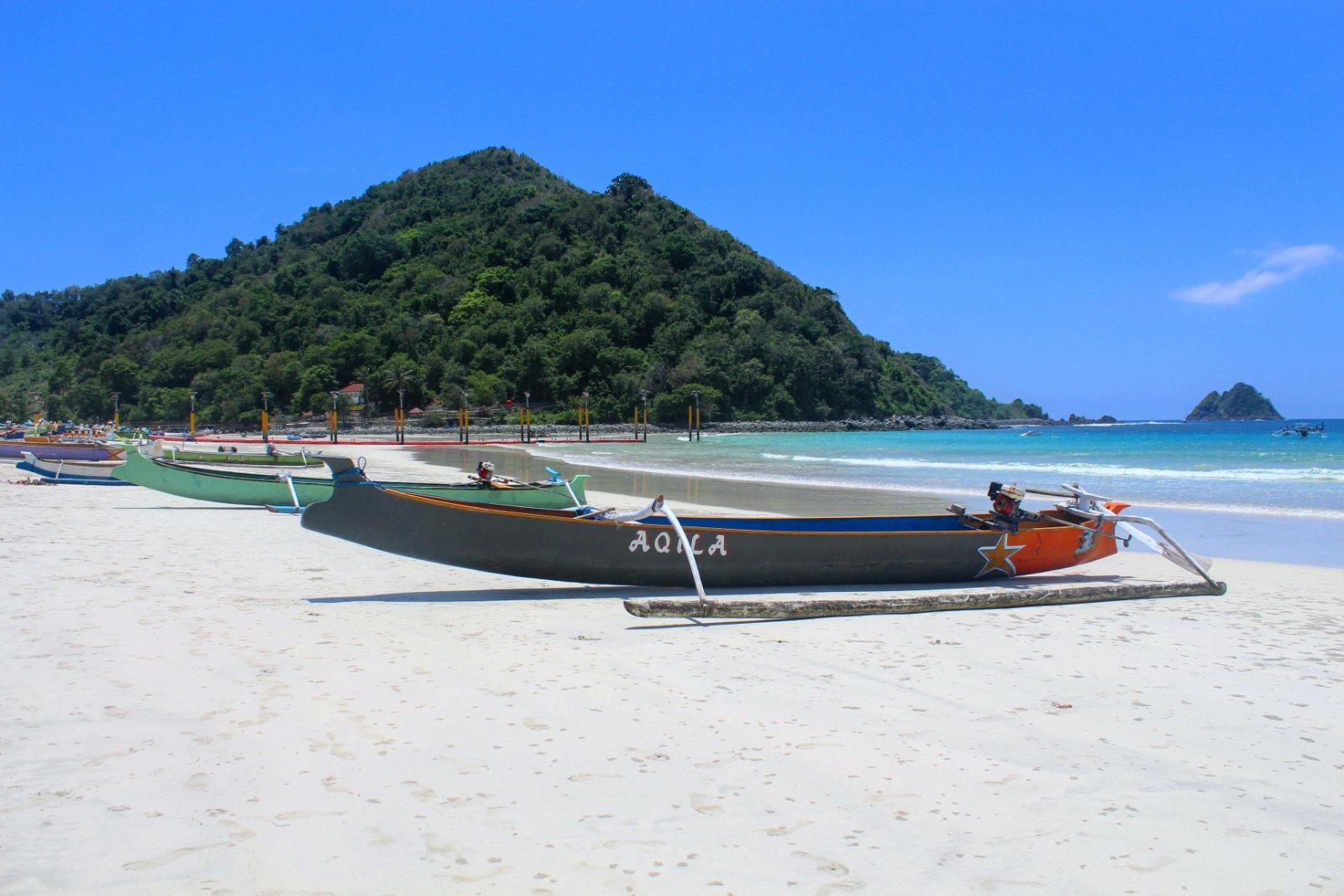 Fishing boats on the sand at Selong Belanak beach, South Lombok, Indonesia