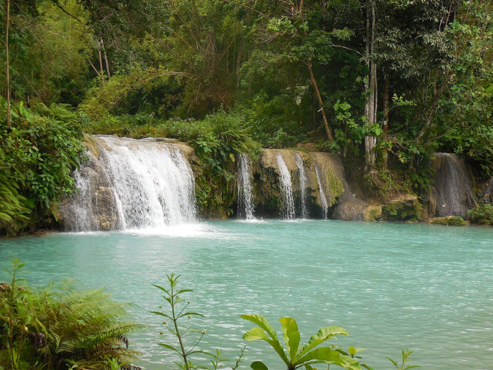 Turquoise pools of Cambugahay Falls on Siquijor Island, Philippines