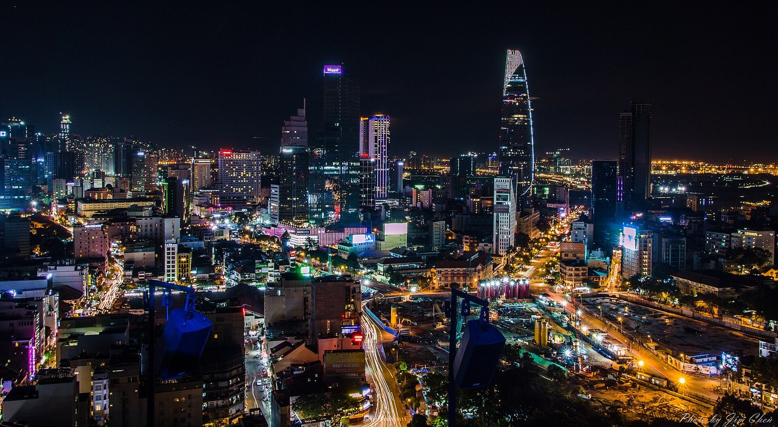 Ho Chi Minh City Skyline (night) — Jim 陳, CC BY-SA 2.0, via Wikimedia Commons